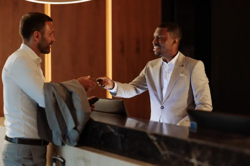 hotel employee with a guest